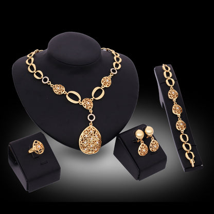 Elegant Four-Piece Jewelry Set: Necklace, Earrings, Bracelet & Ring