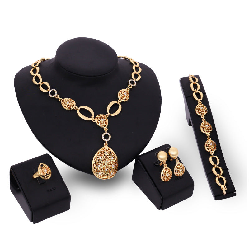 Elegant Four-Piece Jewelry Set: Necklace, Earrings, Bracelet & Ring